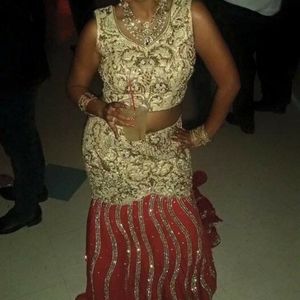 Red and gold stonework crystal gown.